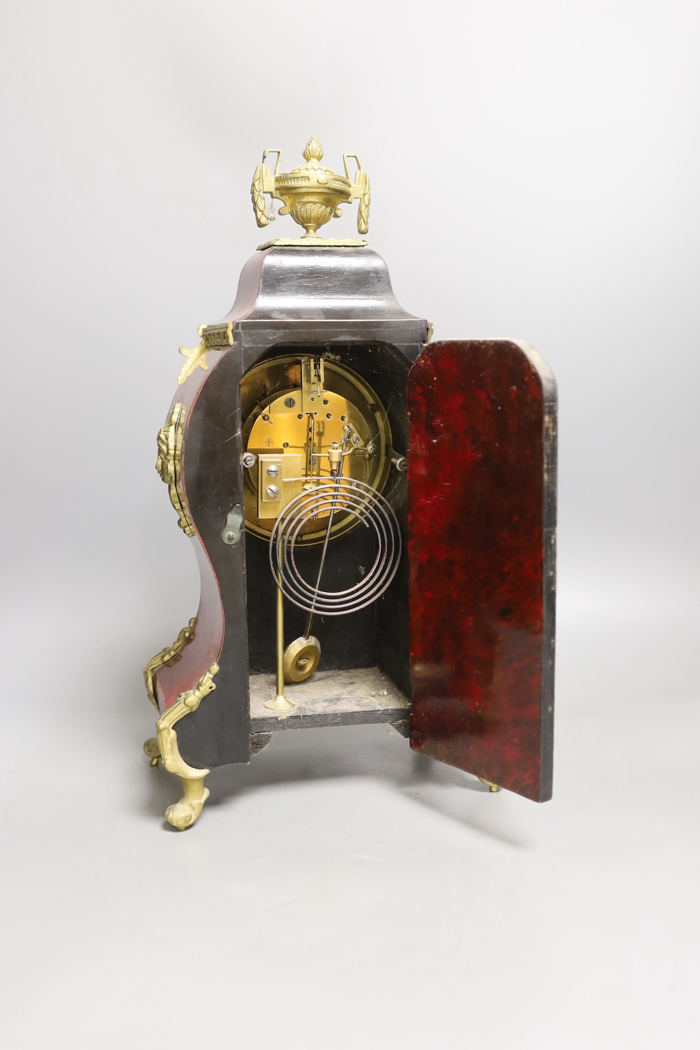 A late 19th century French scarlet tortoiseshell and ormolu mounted mantel clock - 40cm tall